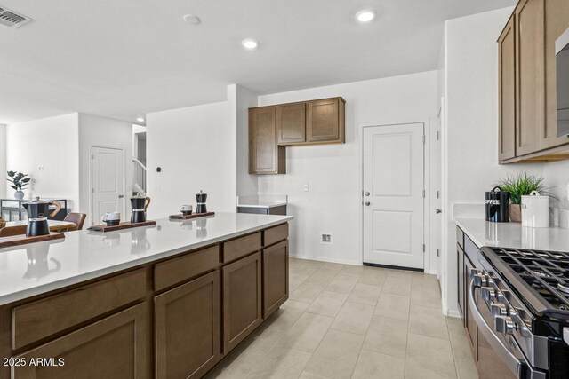 kitchen with appliances with stainless steel finishes, visible vents, light countertops, and recessed lighting