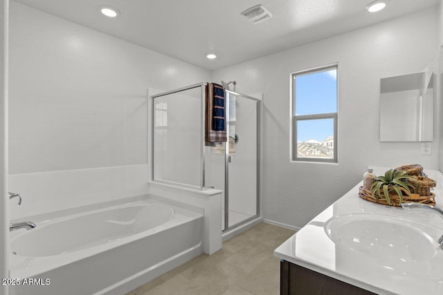 bathroom featuring double vanity, recessed lighting, a sink, a shower stall, and a bath