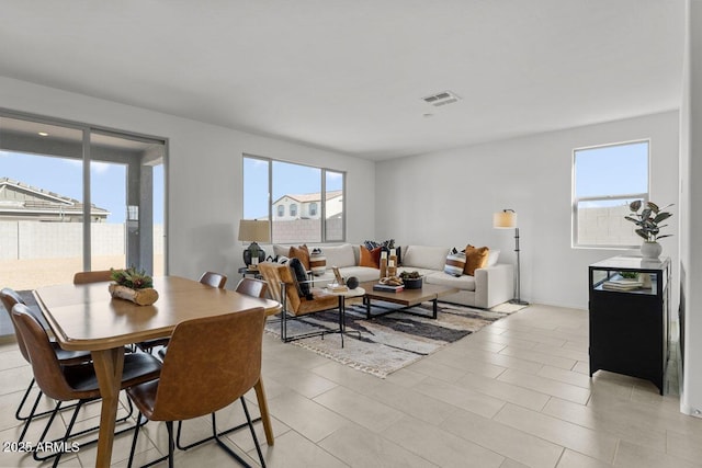 dining room featuring visible vents