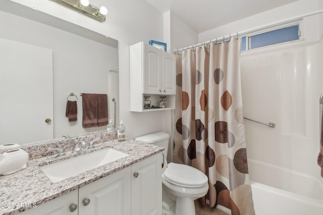 full bathroom with vanity, shower / bathtub combination with curtain, and toilet