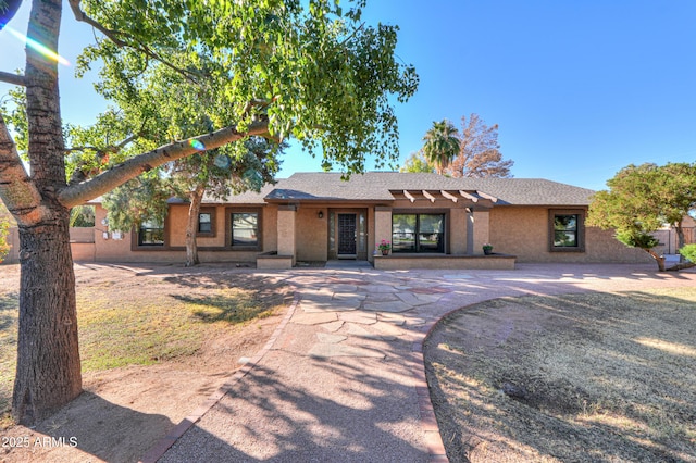 view of front of home with a patio