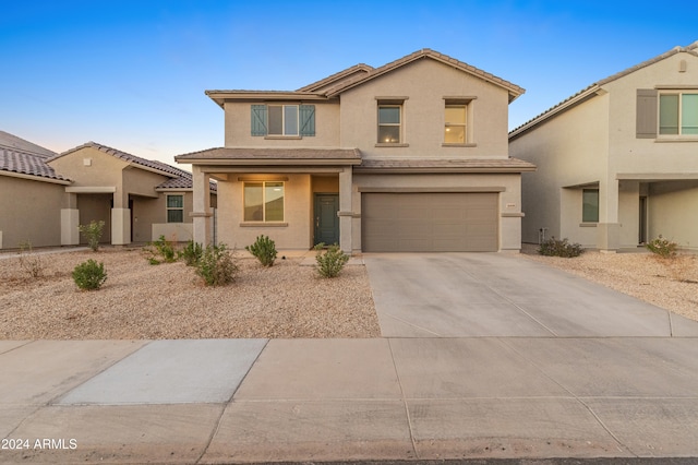 view of front of home with a garage