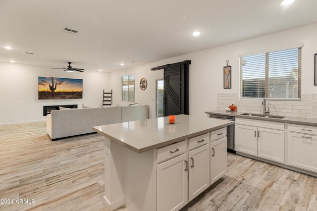 16848 W Alice Ave, Waddell, AZ 85355 - kitchen featuring a sink, dishwasher, light wood-type flooring, a ceiling fan, and recessed lighting