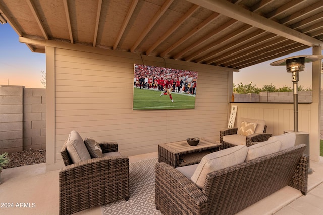 16848 W Alice Ave, Waddell, AZ 85355 - patio terrace at dusk featuring fence and an outdoor living space