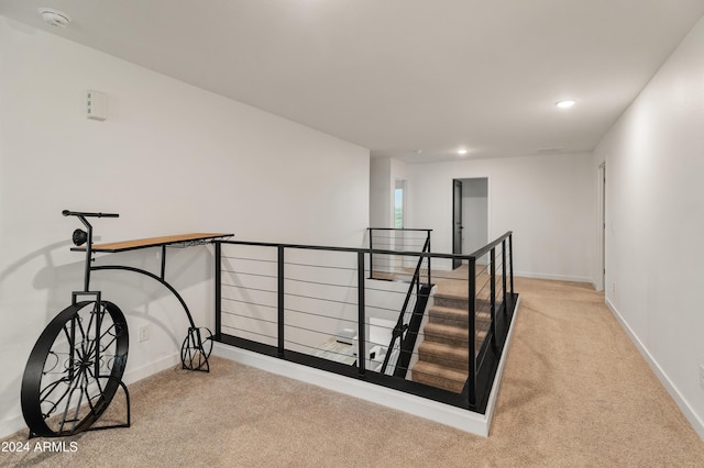 16848 W Alice Ave, Waddell, AZ 85355 - corridor with an upstairs landing, carpet floors, baseboards, and recessed lighting