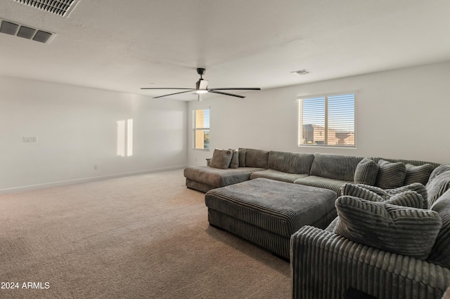 16848 W Alice Ave, Waddell, AZ 85355 - living area featuring a ceiling fan, carpet floors, and baseboards