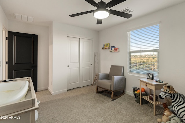 16848 W Alice Ave, Waddell, AZ 85355 - sitting room with light colored carpet, baseboards, and ceiling fan