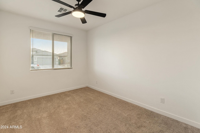 16848 W Alice Ave, Waddell, AZ 85355 - empty room featuring light colored carpet, a ceiling fan, and baseboards