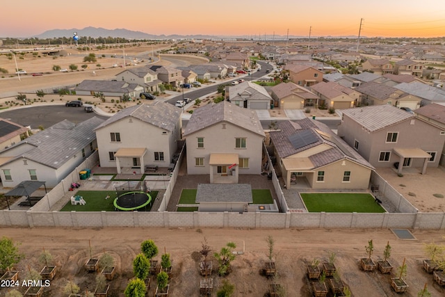 16848 W Alice Ave, Waddell, AZ 85355 - aerial perspective of suburban area featuring a mountainous background