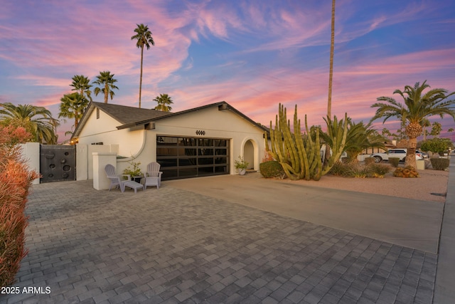 view of front of property featuring a garage