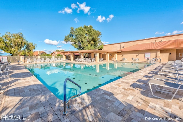 view of pool featuring a patio area