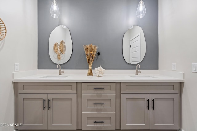 bathroom with a sink and double vanity