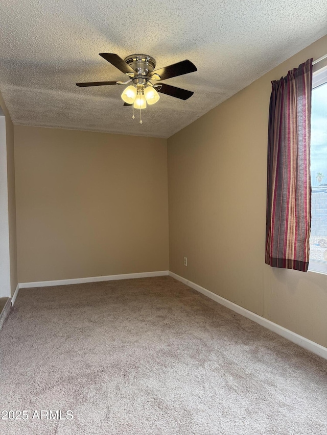 12512 N 85th Ave, Peoria, AZ 85381 - carpeted empty room with a textured ceiling, a ceiling fan, and baseboards