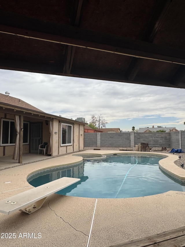 12512 N 85th Ave, Peoria, AZ 85381 - view of pool with a patio area, a fenced backyard, and a diving board