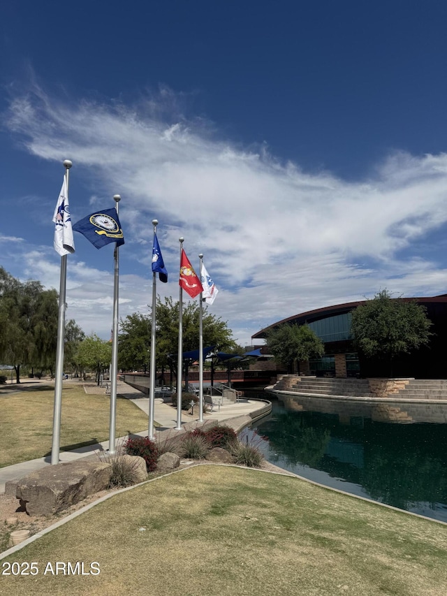 12512 N 85th Ave, Peoria, AZ 85381 - view of home's community featuring a lawn