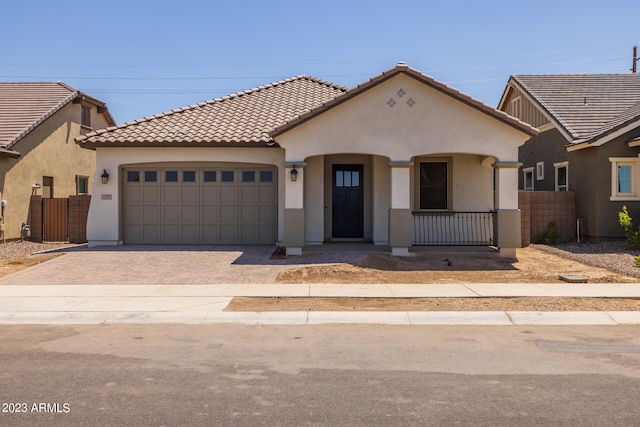 view of front of property with a garage