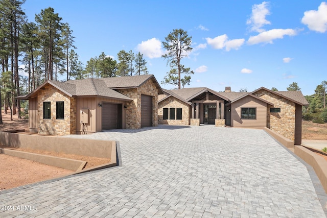 1804 E Senna Pt, Payson, AZ 85541 - ranch-style house featuring an attached garage, board and batten siding, decorative driveway, and stone siding