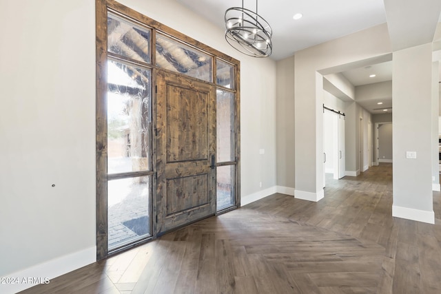 1804 E Senna Pt, Payson, AZ 85541 - entrance foyer with baseboards, an inviting chandelier, and a barn door