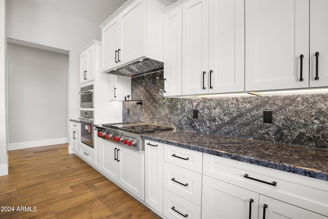 1804 E Senna Pt, Payson, AZ 85541 - kitchen with baseboards, light wood finished floors, white cabinetry, decorative backsplash, and stainless steel appliances
