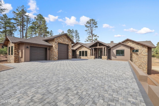1804 E Senna Pt, Payson, AZ 85541 - ranch-style home featuring a garage, decorative driveway, stone siding, and board and batten siding
