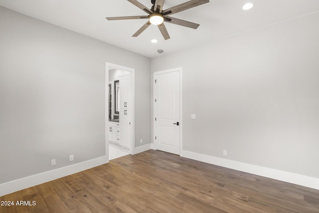 1804 E Senna Pt, Payson, AZ 85541 - unfurnished bedroom featuring wood finished floors, a ceiling fan, ensuite bathroom, baseboards, and recessed lighting