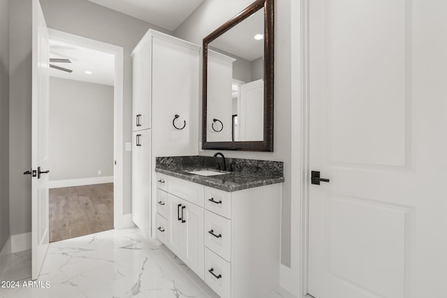 1804 E Senna Pt, Payson, AZ 85541 - bathroom featuring baseboards, marble finish floor, and vanity