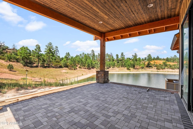 view of patio / terrace featuring a water view