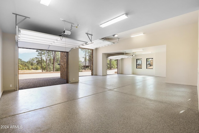 1804 E Senna Pt, Payson, AZ 85541 - garage featuring baseboards and a garage door opener
