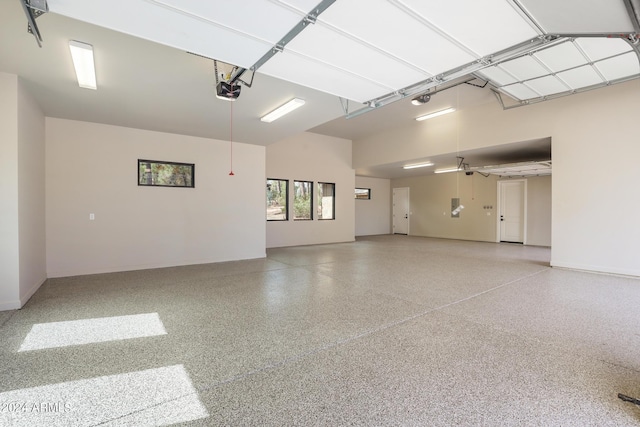 1804 E Senna Pt, Payson, AZ 85541 - garage with baseboards and a garage door opener