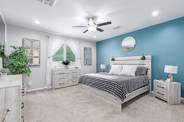 carpeted bedroom with visible vents, recessed lighting, a ceiling fan, and baseboards