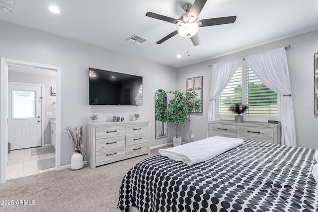 bedroom with recessed lighting, multiple windows, carpet, and visible vents