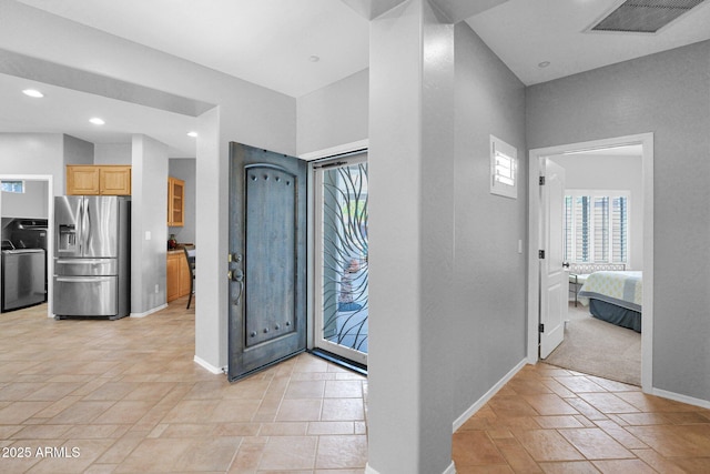 2452 W Muirfield Dr, Anthem, AZ 85086 - corridor featuring recessed lighting, baseboards, washer / clothes dryer, visible vents, and stone finish flooring