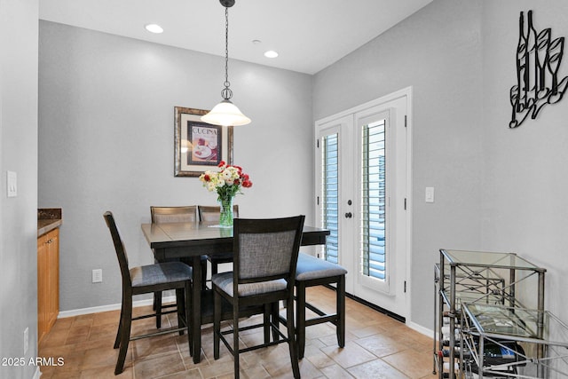 2452 W Muirfield Dr, Anthem, AZ 85086 - dining space featuring baseboards, a wealth of natural light, and recessed lighting