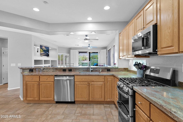 2452 W Muirfield Dr, Anthem, AZ 85086 - kitchen featuring a sink, recessed lighting, ceiling fan, and appliances with stainless steel finishes