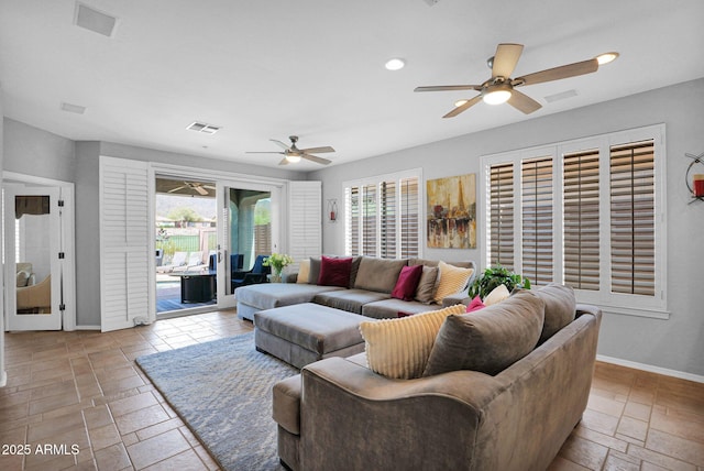 2452 W Muirfield Dr, Anthem, AZ 85086 - living area with baseboards, visible vents, recessed lighting, and a ceiling fan