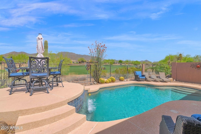 2452 W Muirfield Dr, Anthem, AZ 85086 - view of pool with a fenced in pool, a mountain view, fence, and a patio area