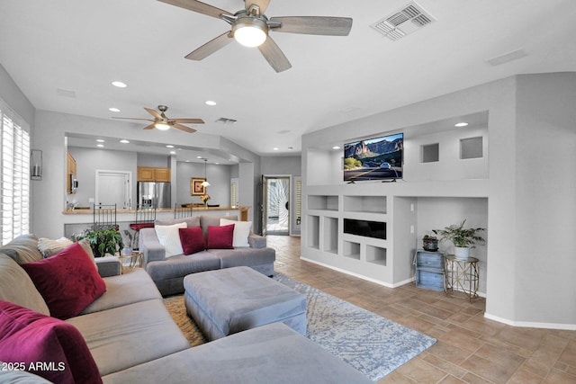 2452 W Muirfield Dr, Anthem, AZ 85086 - living area featuring baseboards, visible vents, recessed lighting, and a ceiling fan
