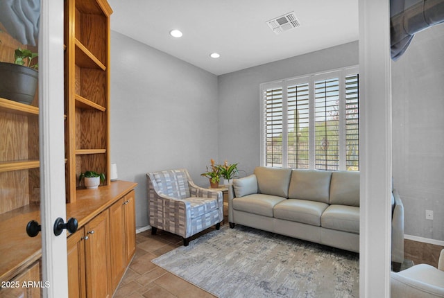2452 W Muirfield Dr, Anthem, AZ 85086 - living room featuring visible vents, recessed lighting, and light tile patterned floors