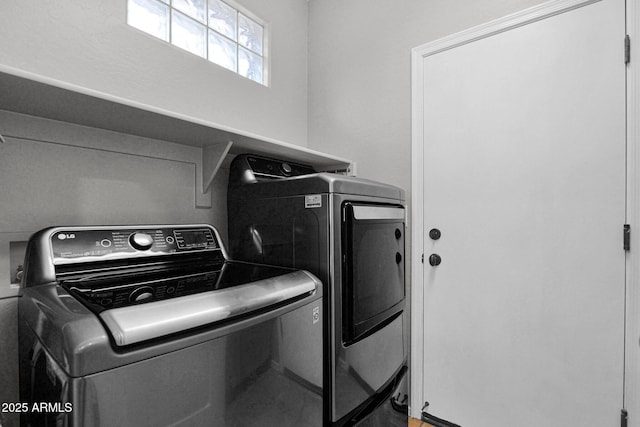 2452 W Muirfield Dr, Anthem, AZ 85086 - laundry area with washing machine and clothes dryer and laundry area