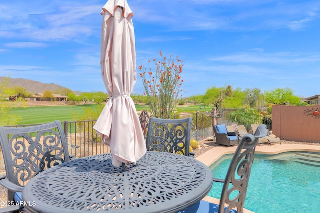 2452 W Muirfield Dr, Anthem, AZ 85086 - exterior space with a patio area, fence, and a fenced in pool