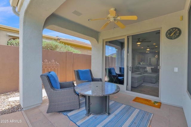 2452 W Muirfield Dr, Anthem, AZ 85086 - view of patio with fence, ceiling fan, and outdoor dining space
