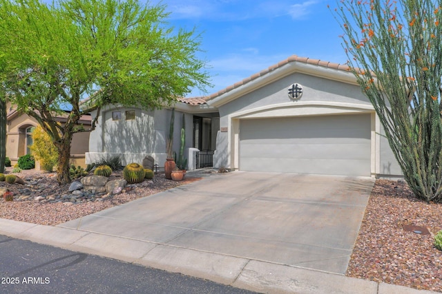 2452 W Muirfield Dr, Anthem, AZ 85086 - single story home with stucco siding, driveway, a garage, and a tiled roof