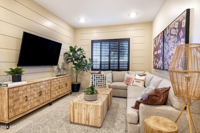 living room with light tile patterned flooring