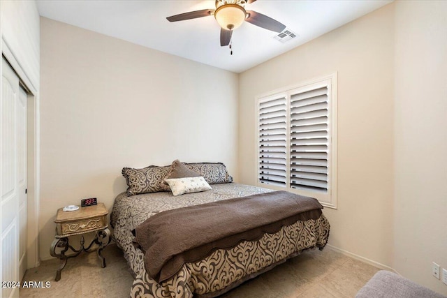 bedroom featuring a closet and ceiling fan