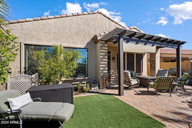 rear view of house featuring a patio area, a lawn, and a pergola