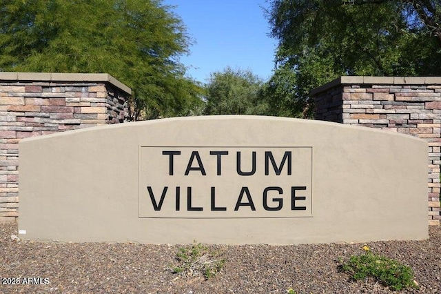 view of community sign