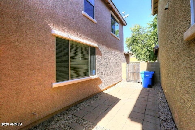 view of home's exterior with a patio