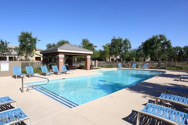 view of pool featuring a gazebo and a patio