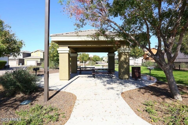 view of community with a patio area and a gazebo