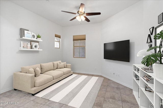 11856 W Lone Tree Trl, Peoria, AZ 85383 - living area featuring a ceiling fan, baseboards, and light tile patterned flooring